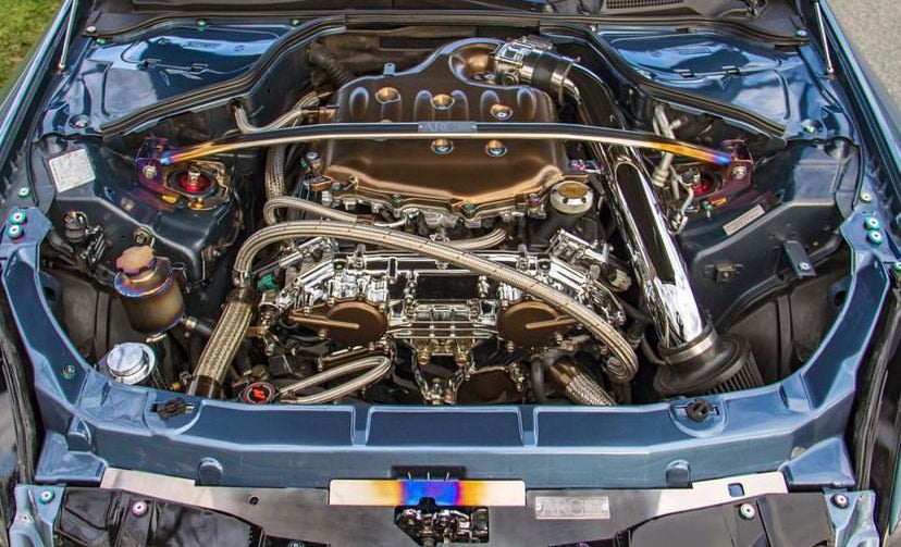 Braided coolant cross over hose